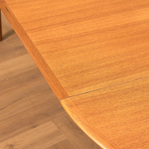 Danish round dining table in teak