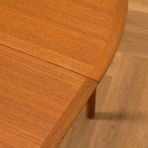 Danish round dining table in teak