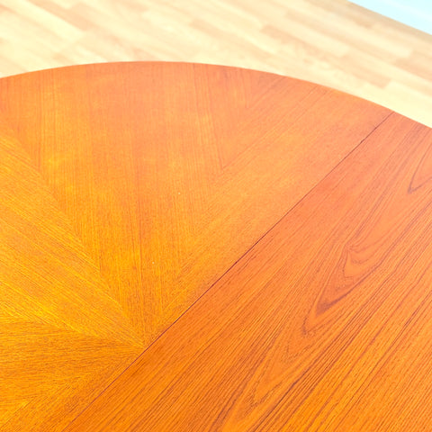Swedish round dining table in teak by David Rosén for NK