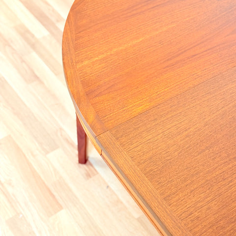 Swedish round dining table in walnut by Skaraborgs Möbelindustri in Tibro