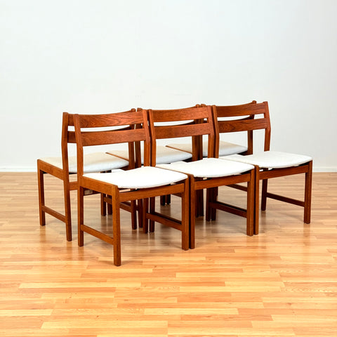 Danish dining chairs in solid oak by Kurt Østervig, for KP Møbler