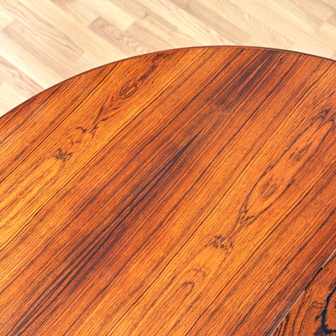 Danish round dining table in Santos rosewood
