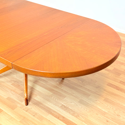 Swedish round dining table in teak by David Rosén for NK
