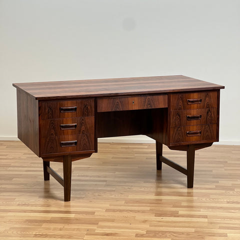 Danish rosewood desk with 7 drawers & a folding door at the back