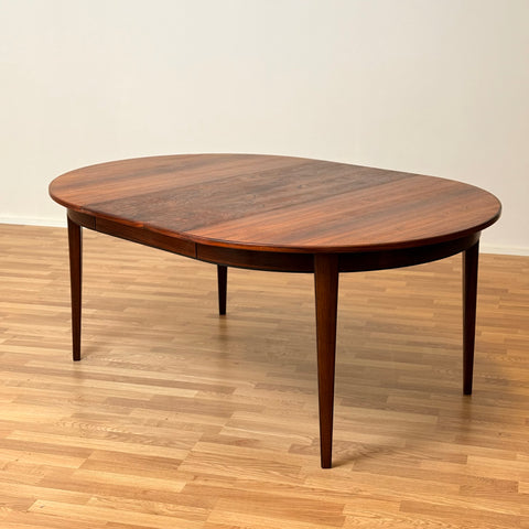 Danish round dining table in Santos rosewood
