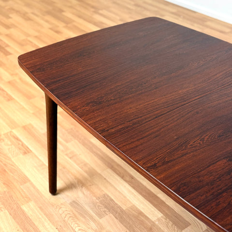 Danish dining table in Santos rosewood by Bruno Hansen