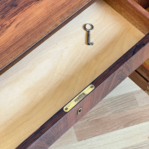 Danish rosewood desk with 7 drawers & a folding door at the back