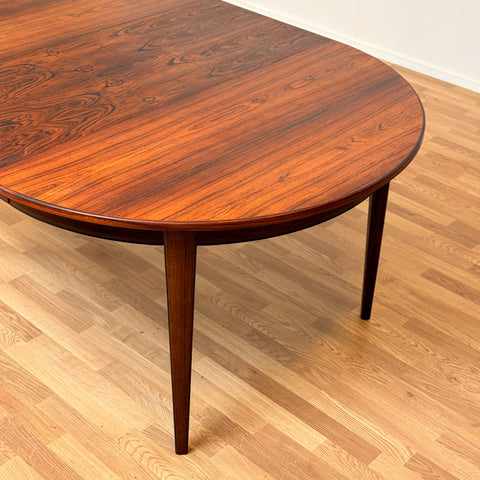 Danish round dining table in Santos rosewood