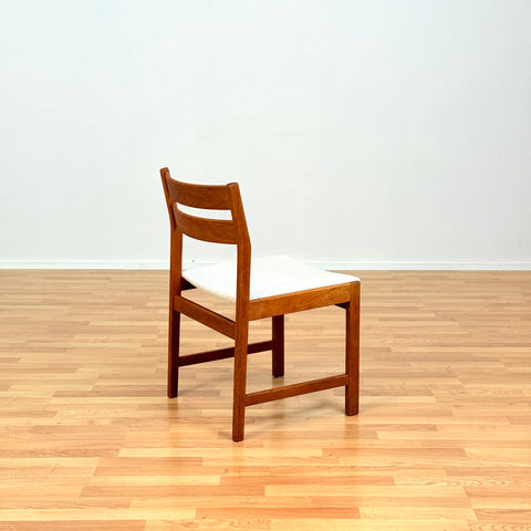 Danish dining chairs in solid oak by Kurt Østervig, for KP Møbler