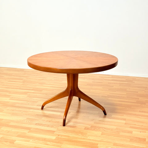 Swedish round dining table in teak by David Rosén for NK