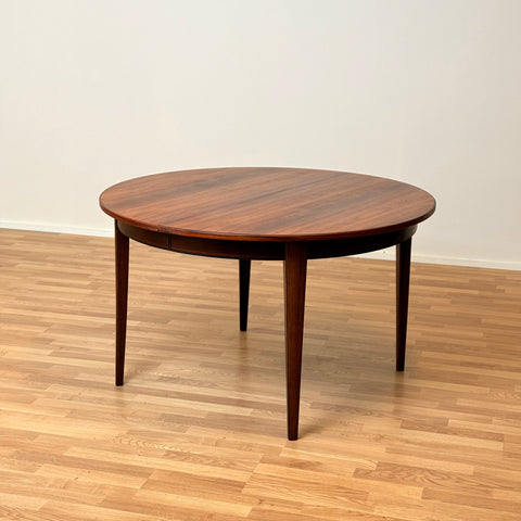 Danish round dining table in Santos rosewood