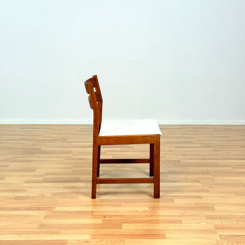 Danish dining chairs in solid oak by Kurt Østervig, for KP Møbler