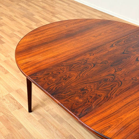 Danish round dining table in Santos rosewood