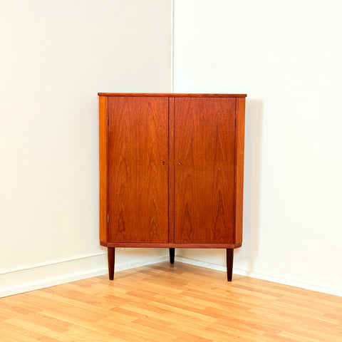 Danish corner cabinet in teak