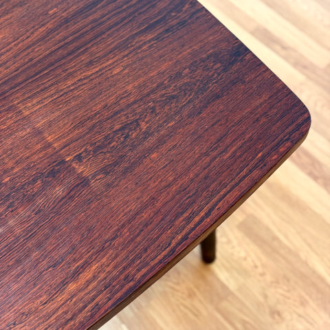 Danish dining table in Santos rosewood by Bruno Hansen