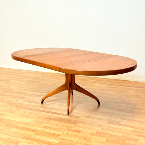 Swedish round dining table in teak by David Rosén for NK