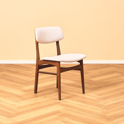 Danish dining chairs in teak and walnut by Farstrup