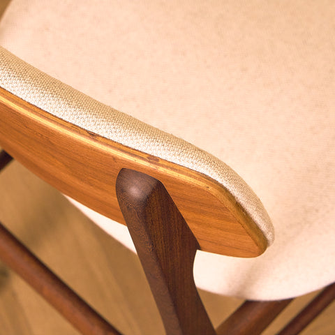 Danish dining chairs in teak and walnut by Farstrup