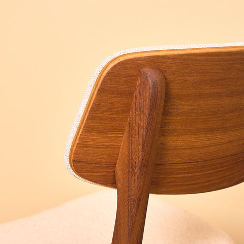 Danish dining chairs in teak and walnut by Farstrup