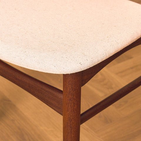 Danish dining chairs in teak and walnut by Farstrup