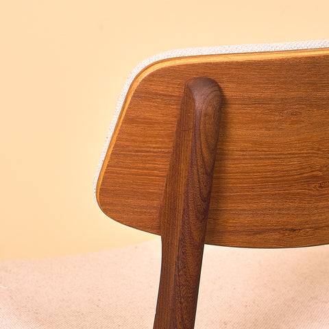 Danish dining chairs in teak and walnut by Farstrup