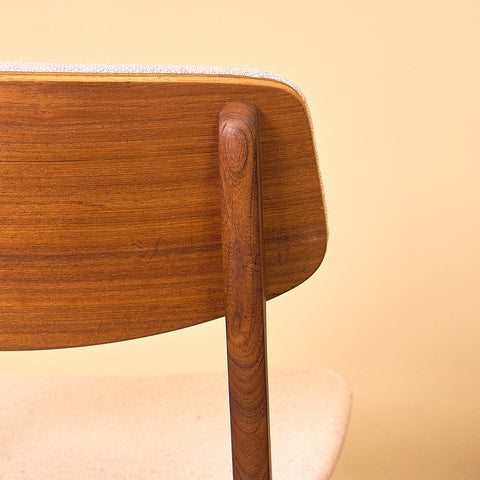 Danish dining chairs in teak and walnut by Farstrup