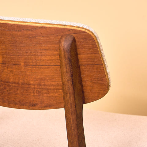 Danish dining chairs in teak and walnut by Farstrup