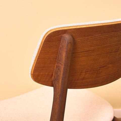 Danish dining chairs in teak and walnut by Farstrup