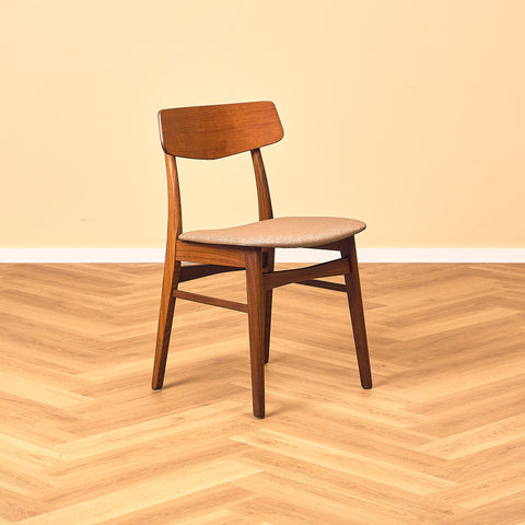 Danish dining chairs in teak & walnut by Farstrup