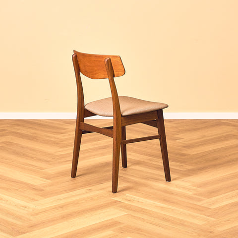 Danish dining chairs in teak & walnut by Farstrup