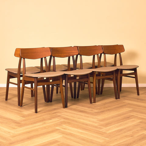 Danish dining chairs in teak & walnut by Farstrup