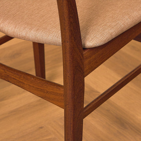 Danish dining chairs in teak & walnut by Farstrup
