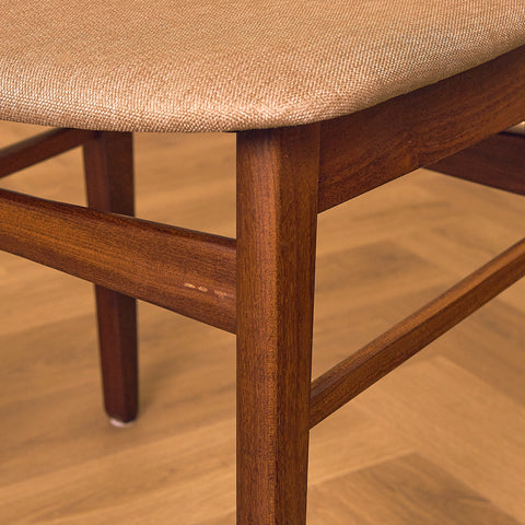 Danish dining chairs in teak & walnut by Farstrup
