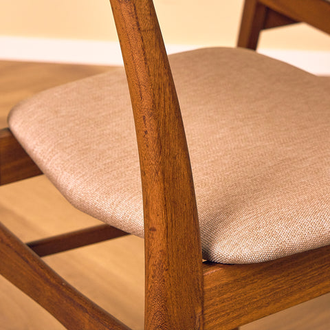 Danish dining chairs in teak & walnut by Farstrup