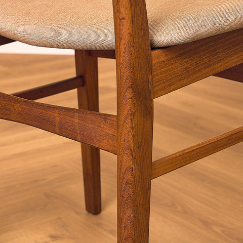 Danish dining chairs in teak & walnut by Farstrup