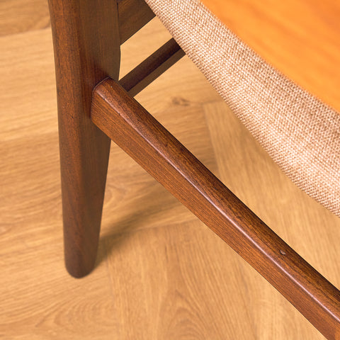 Danish dining chairs in teak & walnut by Farstrup