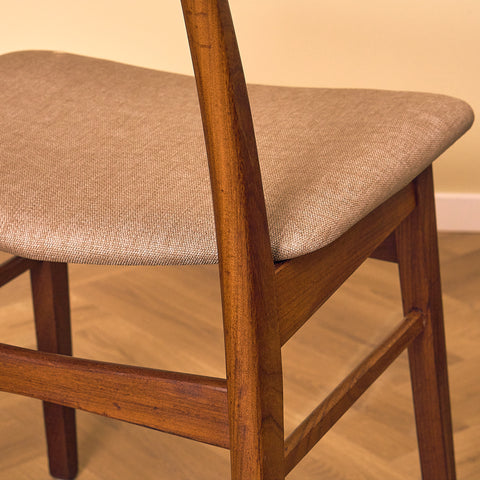 Danish dining chairs in teak & walnut by Farstrup