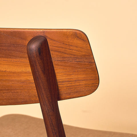 Danish dining chairs in teak & walnut by Farstrup