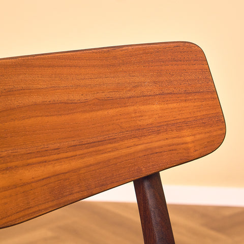 Danish dining chairs in teak & walnut by Farstrup