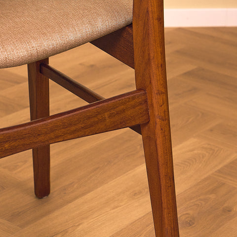 Danish dining chairs in teak & walnut by Farstrup