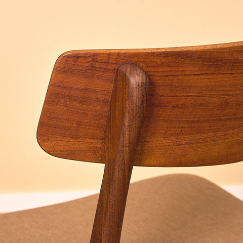 Danish dining chairs in teak & walnut by Farstrup