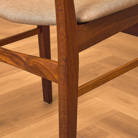 Danish dining chairs in teak & walnut by Farstrup
