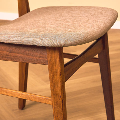 Danish dining chairs in teak & walnut by Farstrup