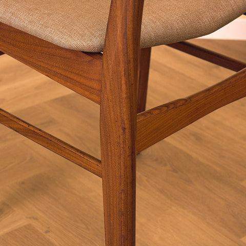 Danish dining chairs in teak & walnut by Farstrup