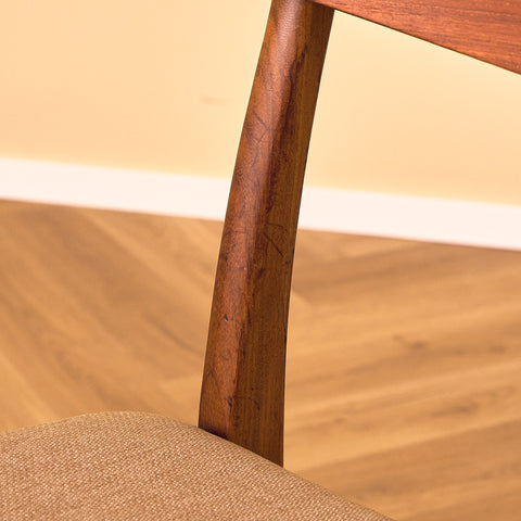 Danish dining chairs in teak & walnut by Farstrup
