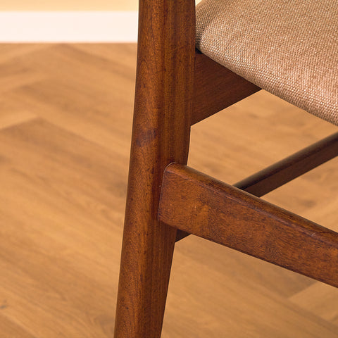 Danish dining chairs in teak & walnut by Farstrup
