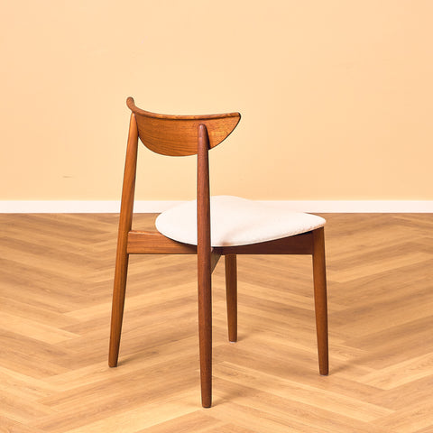 Single danish dining chairs in teak by Harry Østergaard