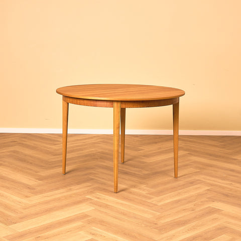 Swedish round dining table in teak and beech