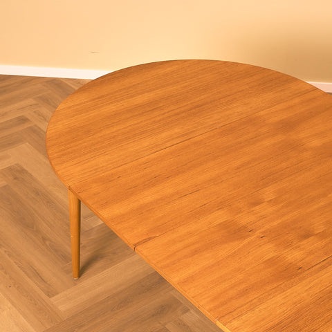 Swedish round dining table in teak and beech