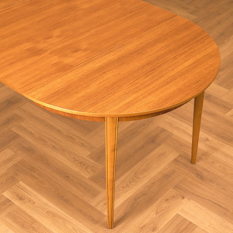 Swedish round dining table in teak and beech